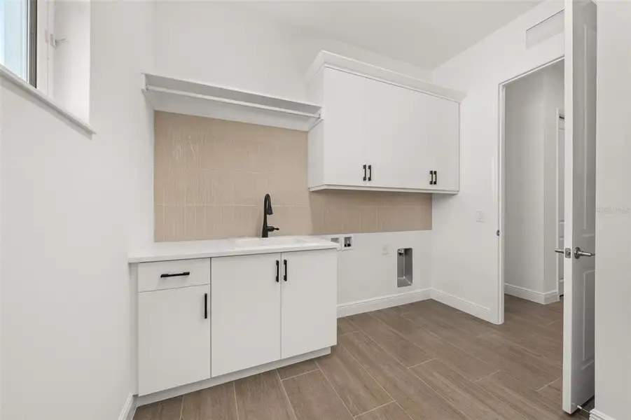 Furnished interior view inside a new home in , Sarasota (Image 36).