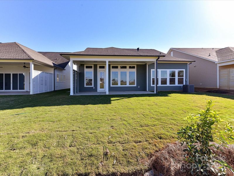 Exterior details and patio area of a home in Encore at Streamside - Tradition Series, Waxhaw (Image 3).