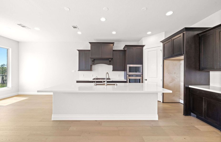 Representative furnished interior of a home built from the 3054 by Ravenna Homes in The Highlands 55′, Porter (Image 8). Representative furnished interior of a home built from the 3054 by Ravenna Homes in The Highlands 55′, Porter (Image 8).