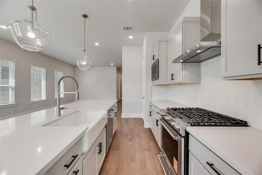 Furnished interior view inside a new home in Collin Creek, Plano (Image 9).