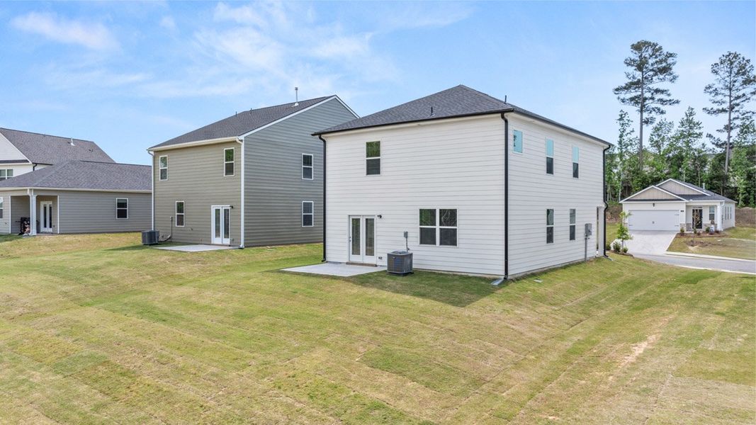 Front exterior of a new home in The Abbey at Trolley Run Station, Aiken, SC, highlighting curb appeal (Image 24).