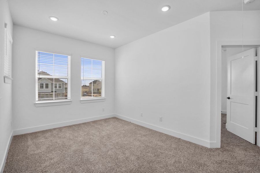 Spacious, unfurnished interior of a new home in Meridiana, Manvel (Image 24).