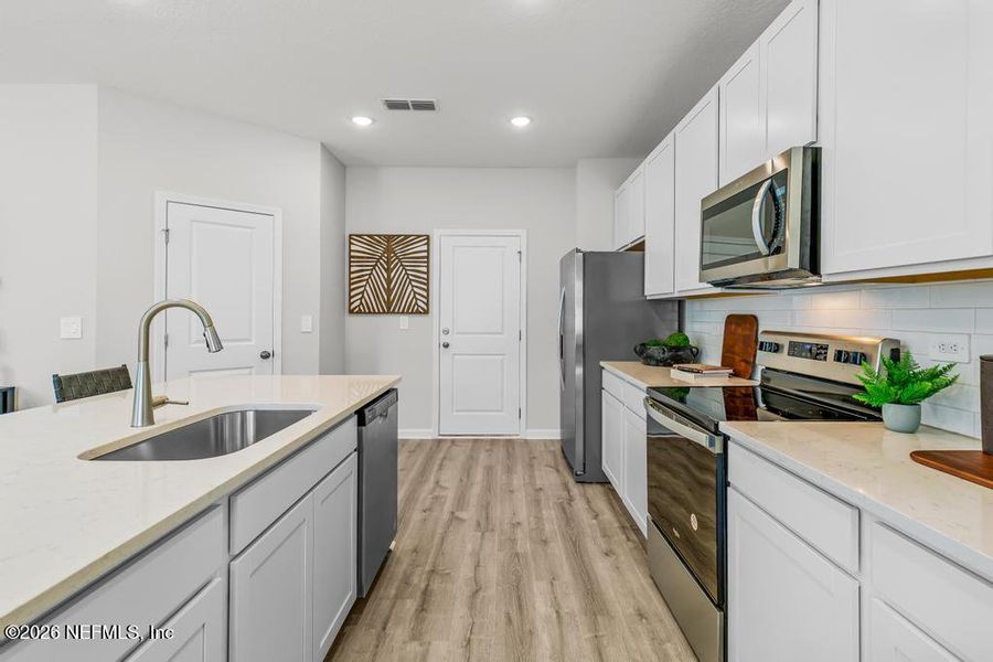 Furnished interior view inside a new home in The Landings at Pecan Park, Jacksonville (Image 36).