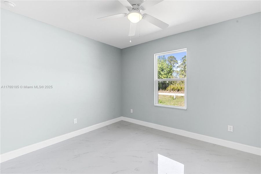 Spacious, unfurnished interior of a new home in , Lehigh Acres (Image 9).