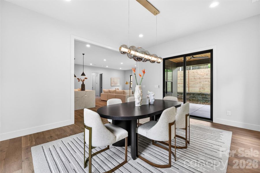 Dedicated Dining Room opens up to covered back porch