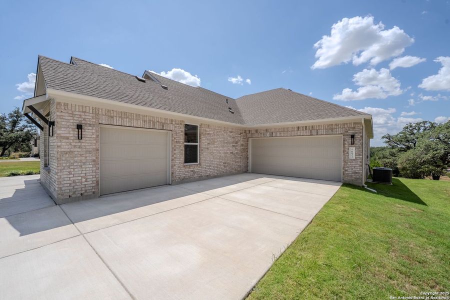 Front exterior of a new home in Arbors at Fair Oaks, Fair Oaks Ranch, TX, highlighting curb appeal (Image 24).
