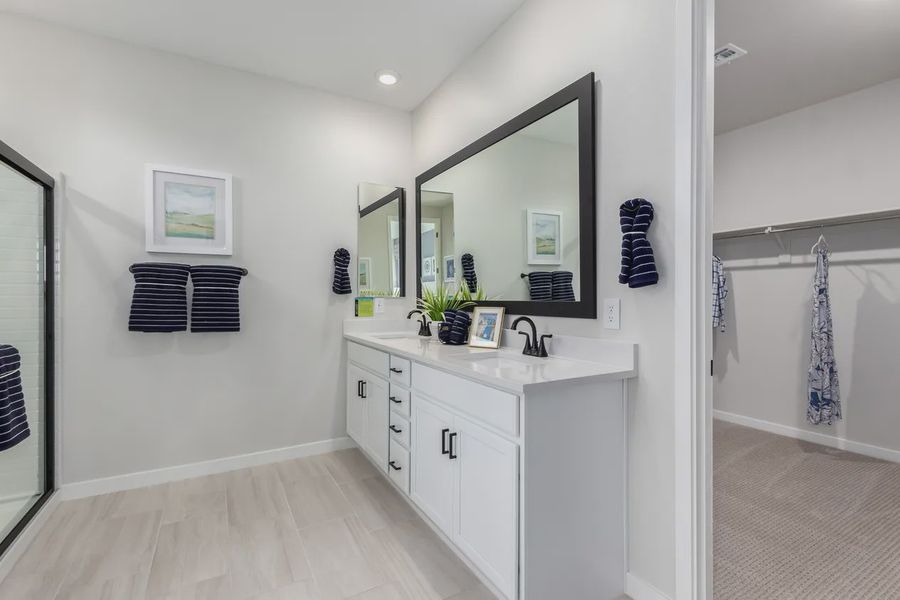Representative furnished interior of a home built from the Granite Vista Avanti - Plan 1901 by Elliott Homes in Avanti at Granite Vista, Waddell (Image 12).