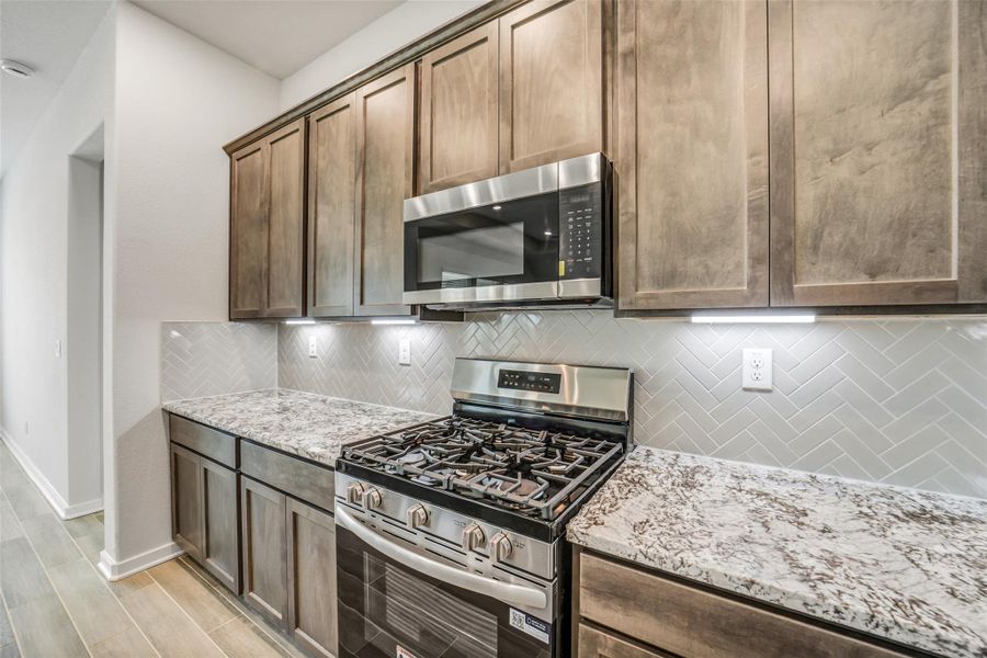 Furnished interior view inside a new home in Windmill Estates, Magnolia (Image 17).