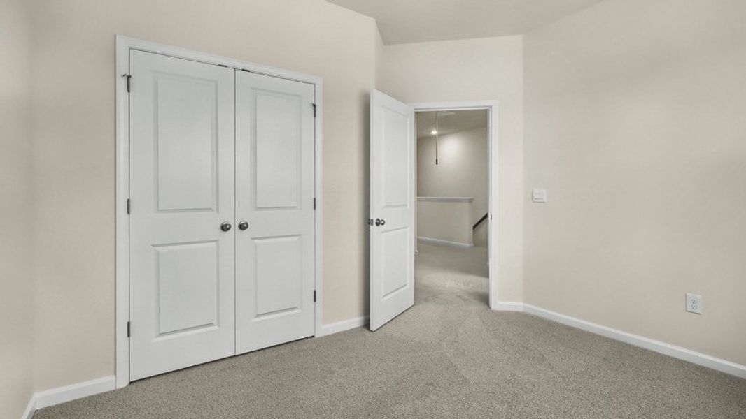 Spacious, unfurnished interior of a new home in The Townes at Madden West, Fuquay Varina (Image 19).