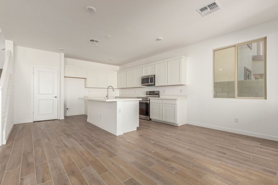 Furnished interior view inside a new home in Wildera, San Tan Valley (Image 3). Furnished interior view inside a new home in Wildera, San Tan Valley (Image 3).