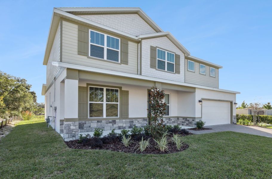 Representative exterior photo of a completed home built from the Clementine by Hartizen Homes in Eden Crest, Apopka, FL (Image 20).