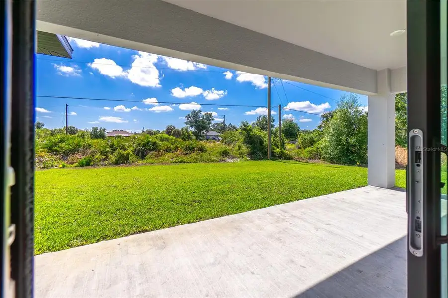 Exterior details and patio area of a home in , Port Charlotte (Image 33).