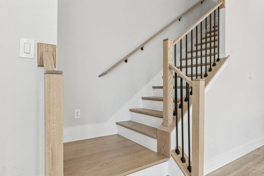 Representative unfurnished interior of a home built from the Hamilton by Centre Living Homes in Newman Village Townhomes, Frisco (Image 22).