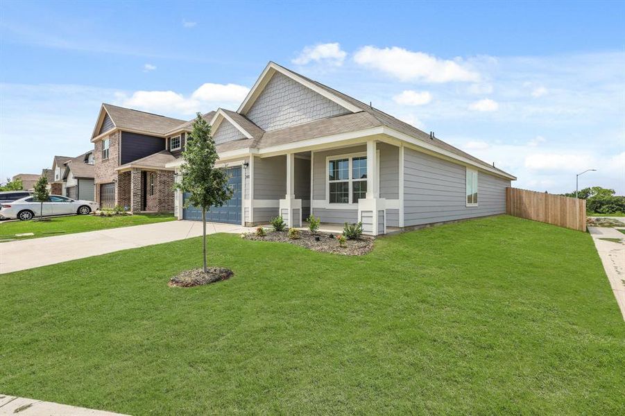 Front exterior of a new home in Sycamore Landing, Fort Worth, TX, highlighting curb appeal (Image 13). Front exterior of a new home in Sycamore Landing, Fort Worth, TX, highlighting curb appeal (Image 13).