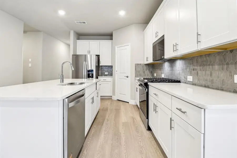 Photo is not of the actual home, but is an inspirational photo of builder’s model home and may depict options, furnishings, and/or decorator features that are not included.