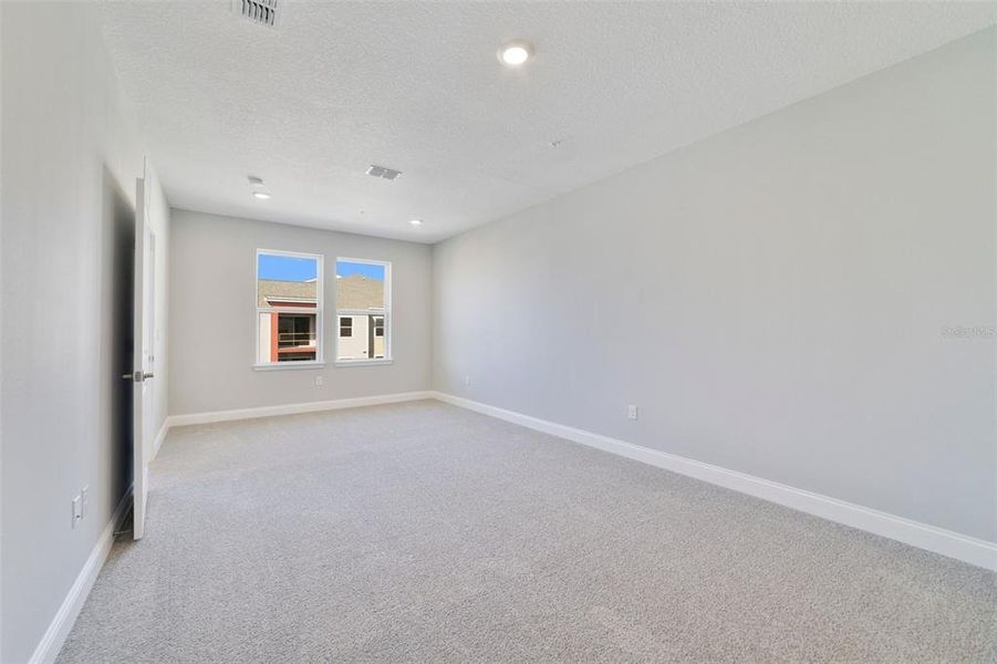 Spacious, unfurnished interior of a new home in Gatherings® of Lake Nona, Orlando (Image 25).