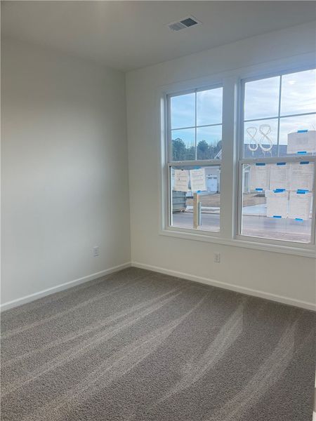 Spacious, unfurnished interior of a new home in Springwood Grove, Central (Image 10).