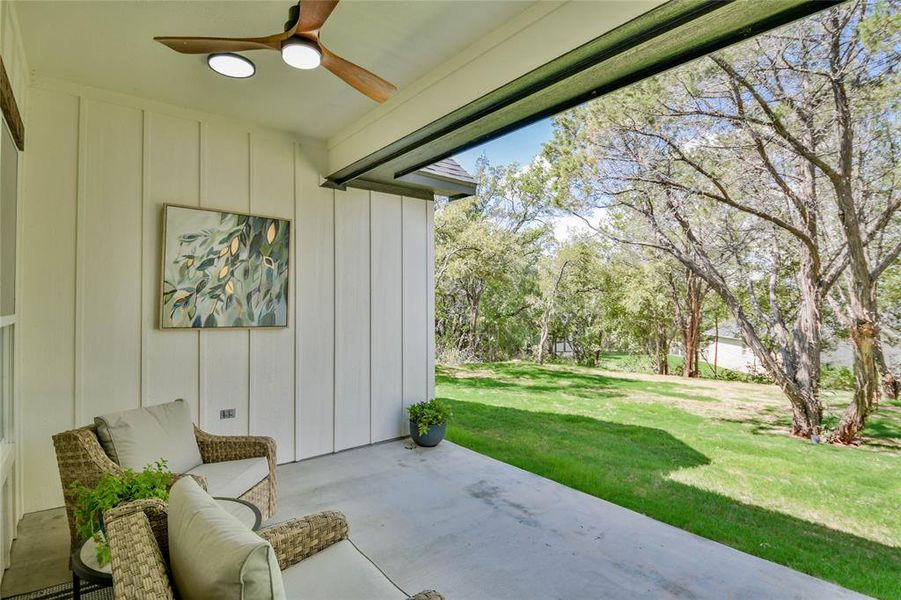 View of patio featuring a ceiling fan View of patio featuring a ceiling fan