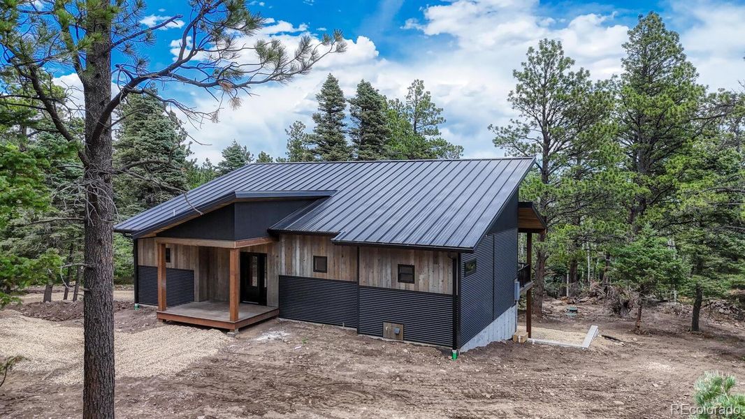 Front exterior of a new home in , Westcliffe, CO, highlighting curb appeal (Image 18).