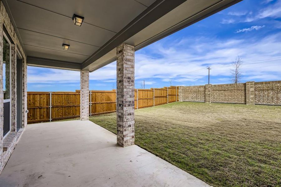 Exterior details and patio area of a home in Ten Mile Creek 55s, Celina (Image 4).