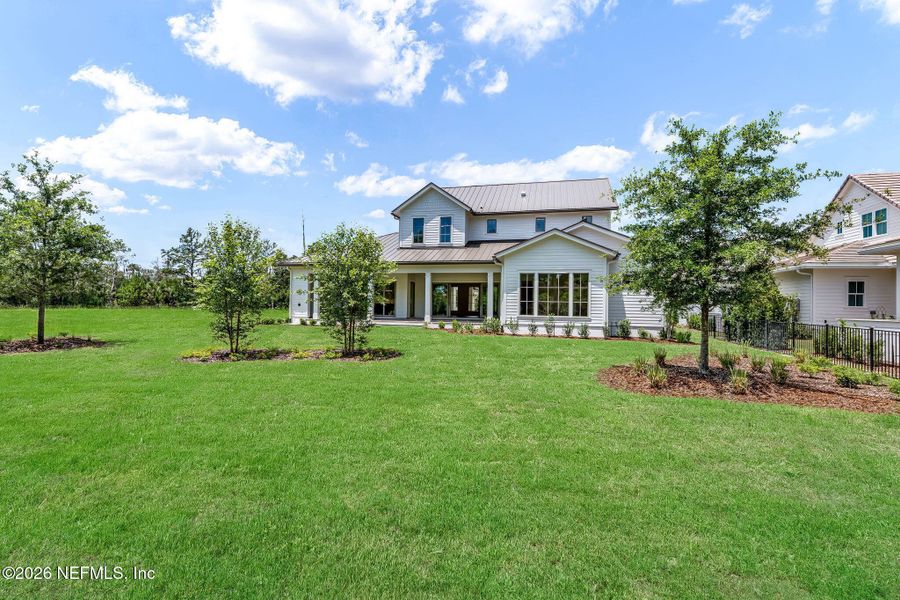 Front exterior of a new home in , Ponte Vedra, FL, highlighting curb appeal (Image 29).