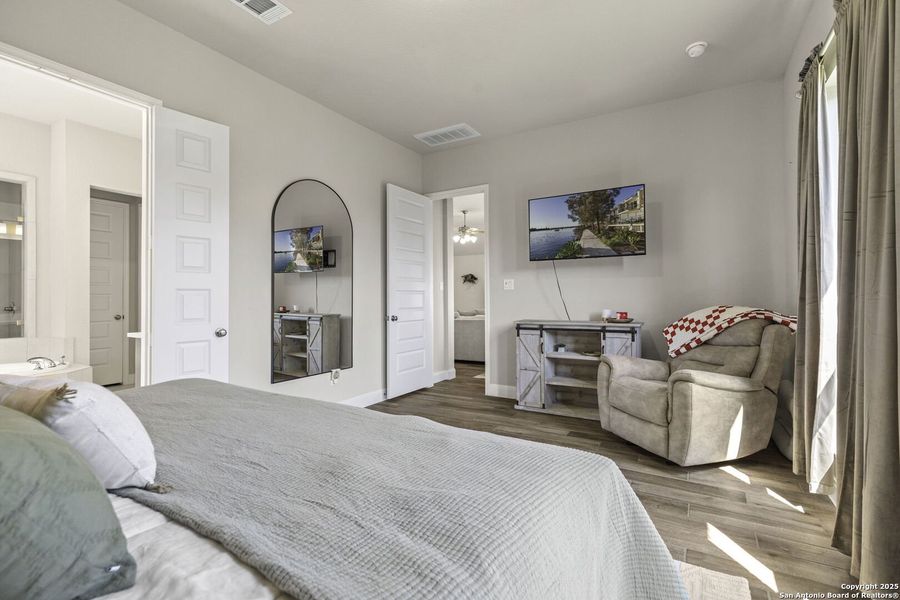 Furnished interior view inside a new home in The Village of Mill Creek 50', Seguin (Image 17).