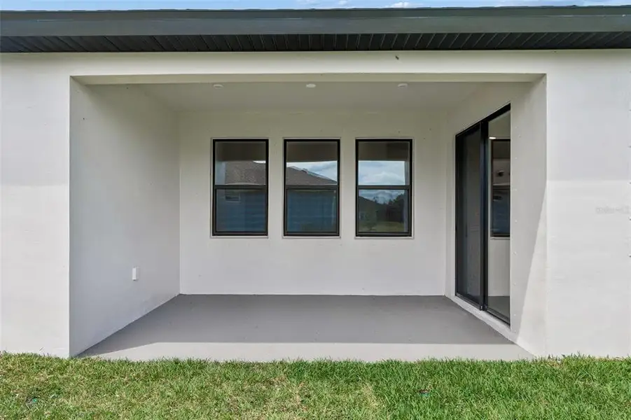Exterior details and patio area of a home in Isles at Bayview, Parrish (Image 33). Exterior details and patio area of a home in Isles at Bayview, Parrish (Image 33).