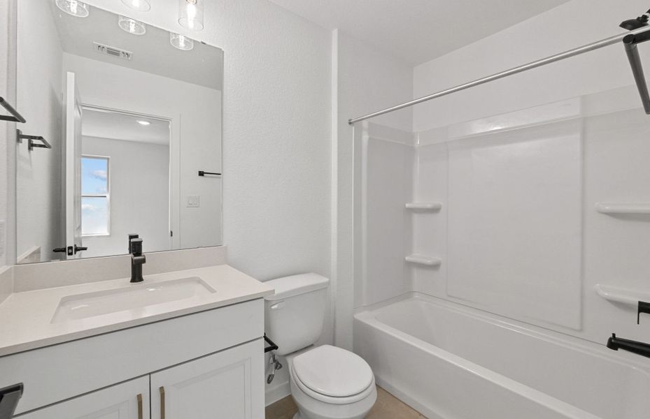 Furnished interior view inside a new home in Wolf Ranch, Georgetown (Image 8).