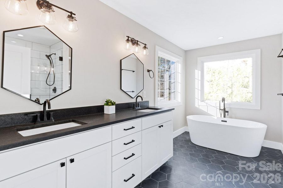 "The Laurel". Primary Ensuite. Representative photo from Corner Rock Builders showing similar floorplan, craftsmanship, quality of construction and finish level. "The Laurel". Primary Ensuite. Representative photo from Corner Rock Builders showing similar floorplan, craftsmanship, quality of construction and finish level.