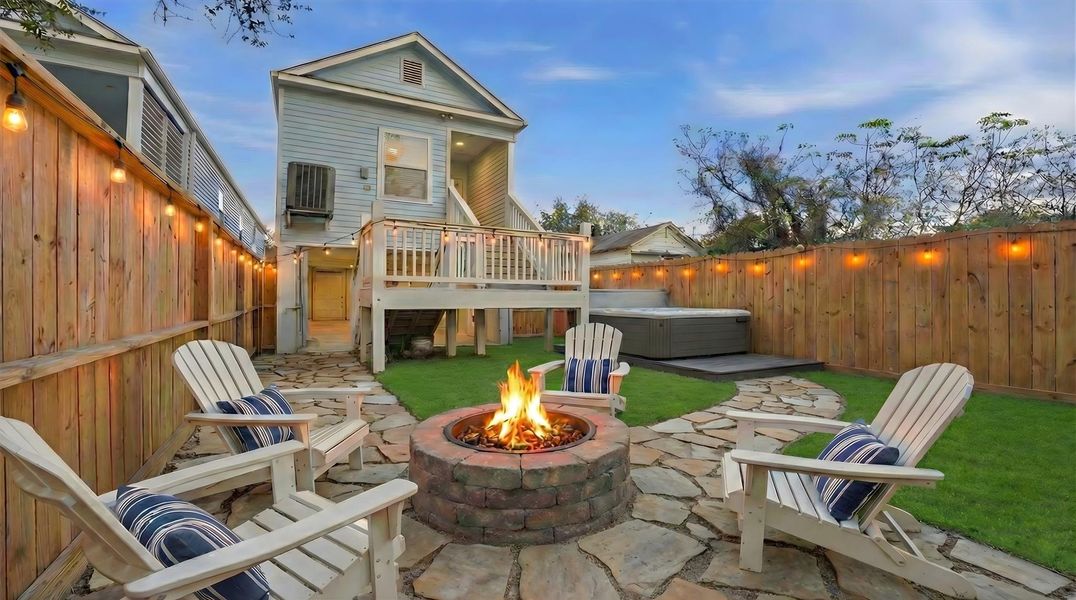 This private VIRTUALLY STAGED backyard showcases the potential for creating an inviting outdoor retreat, with ample space to add seating, a firepit, or entertainment features that enhance both personal enjoyment and short-term rental appeal. *Virtually staged.*