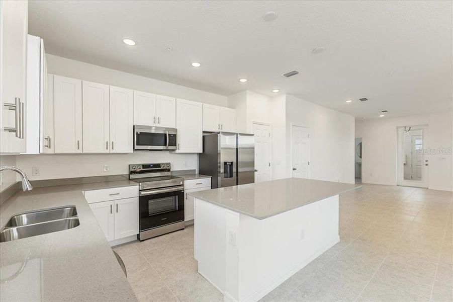 Furnished interior view inside a new home in The Residences at Emerson Park, Apopka (Image 3).