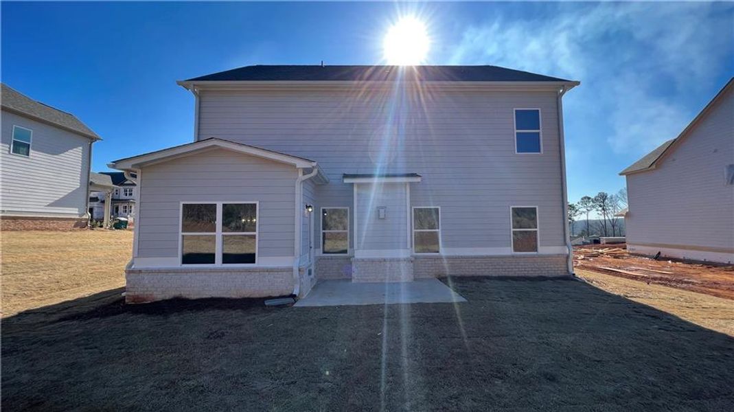 Front exterior of a new home in Overlook at Hamilton Mill, Auburn, GA, highlighting curb appeal (Image 16). Front exterior of a new home in Overlook at Hamilton Mill, Auburn, GA, highlighting curb appeal (Image 16).