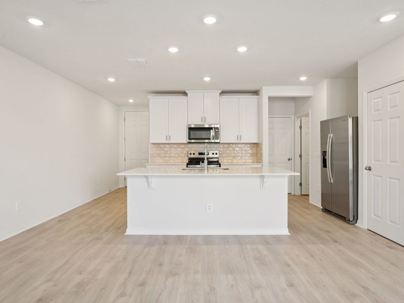Furnished interior view inside a new home in The Meadow at Crossprairie Townes, St. Cloud (Image 3). Furnished interior view inside a new home in The Meadow at Crossprairie Townes, St. Cloud (Image 3).