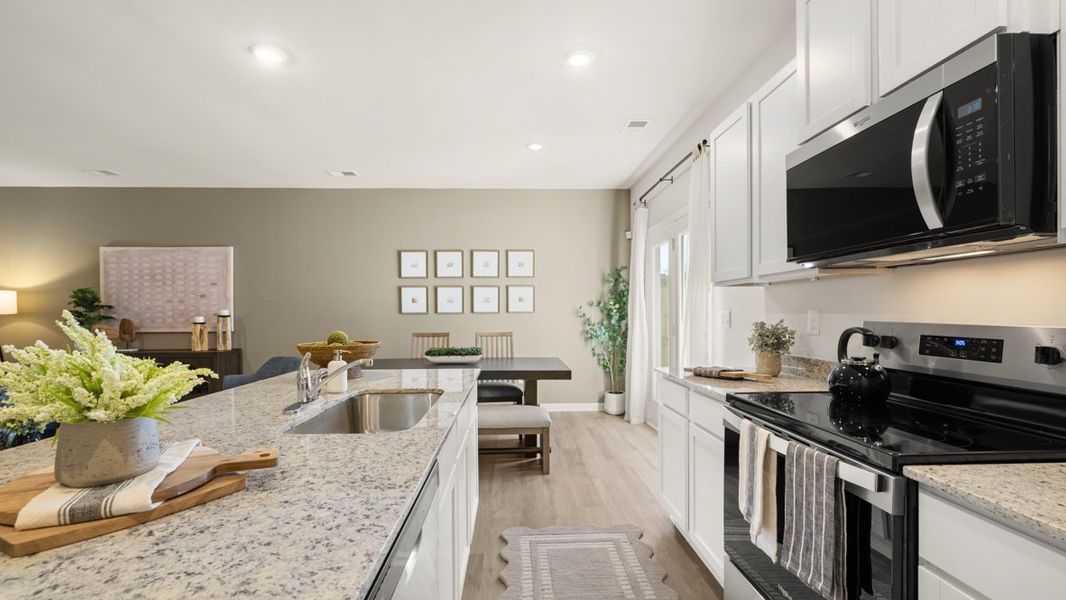 Representative furnished interior of a home built from the Sudbury 24' Townhome by D.R. Horton in Oconee Overlook Townhomes, Gainesville (Image 9).