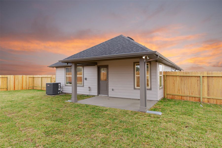 Exterior details and patio area of a home in Montgomery Ridge: Landmark Collection, Montgomery (Image 25).