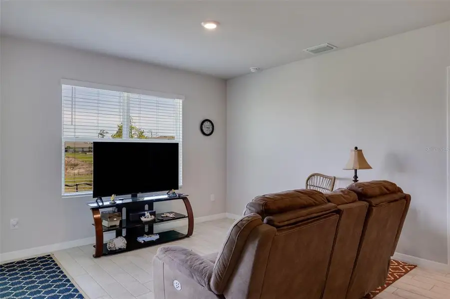 Furnished interior view inside a new home in Coral Bay - Express & Tradition, North Fort Myers (Image 7).