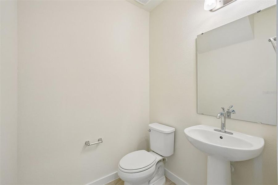 Furnished interior view inside a new home in Grasslands West, Lakeland (Image 15).