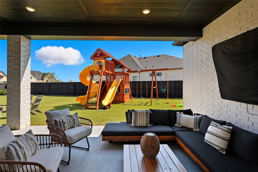 Amazing oversized covered patio. View from double sliding glass doors. Amazing oversized covered patio. View from double sliding glass doors.