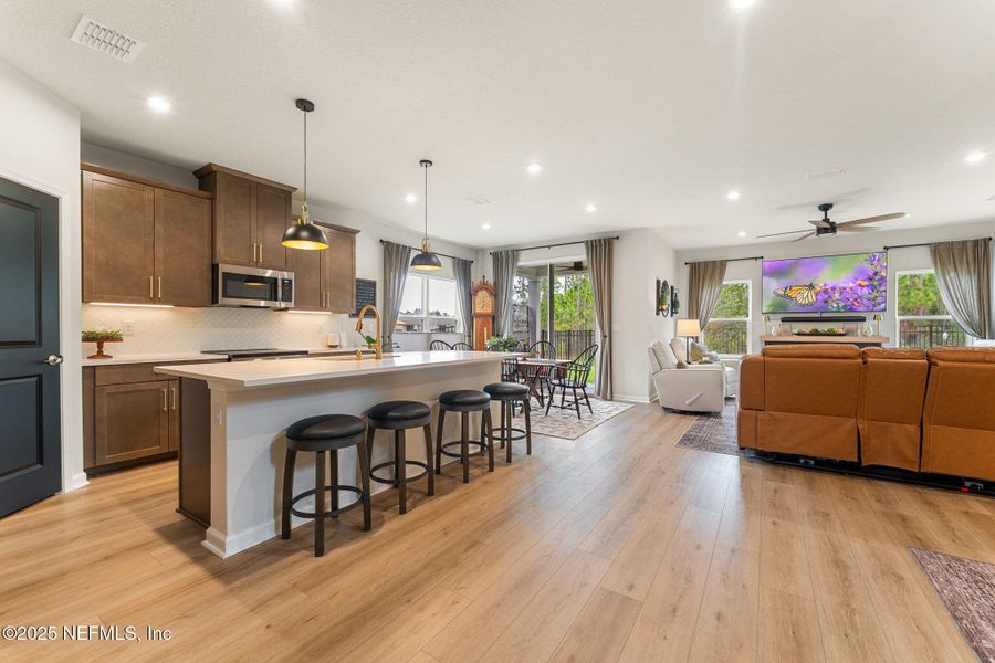 Furnished interior view inside a new home in Seminole Palms Single-Family Homes, Palm Coast (Image 38).