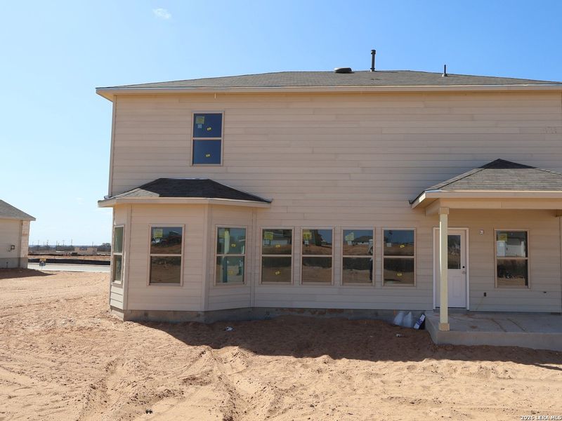 Exterior details and patio area of a home in Hickory Ridge, Elmendorf (Image 17).
