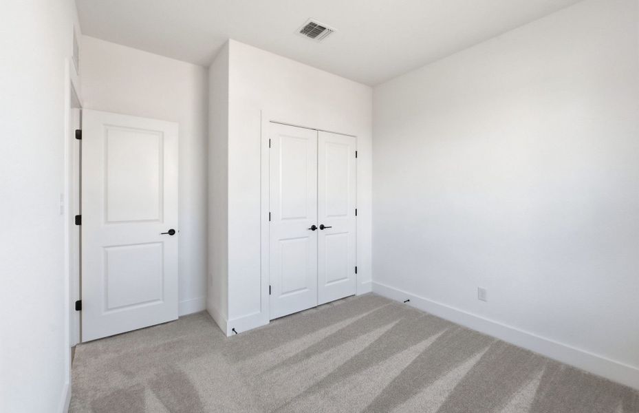 Spacious, unfurnished interior of a new home in Saddleback at Santa Rita Ranch, Liberty Hill (Image 42).