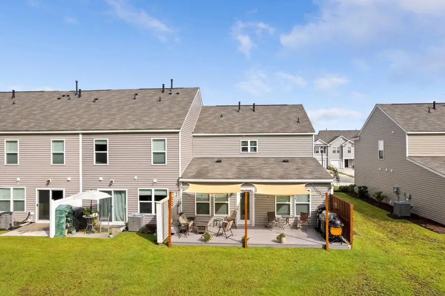 Exterior details and patio area of a home in , Summerville (Image 25).