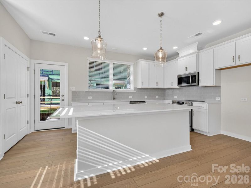 Furnished interior view inside a new home in Central Living at Craig, Charlotte (Image 11).