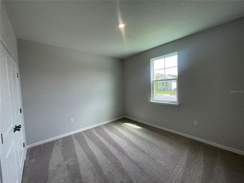 Spacious, unfurnished interior of a new home in Magnolia Series at Seminole Palms, Palm Coast (Image 19).