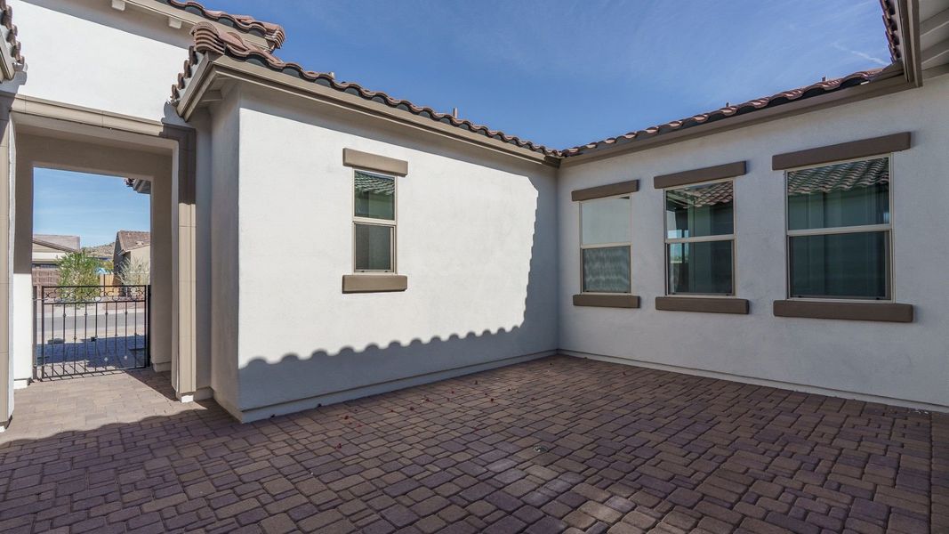 Exterior details and patio area of a home in Harmony at Montecito in Estrella, Goodyear (Image 3).