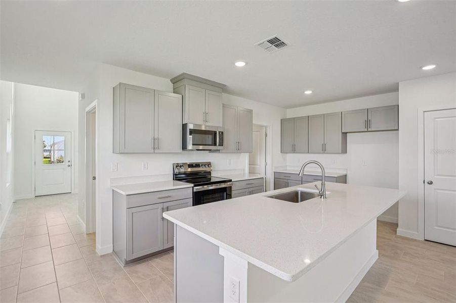 Furnished interior view inside a new home in Willowbrook North, Winter Haven (Image 9).