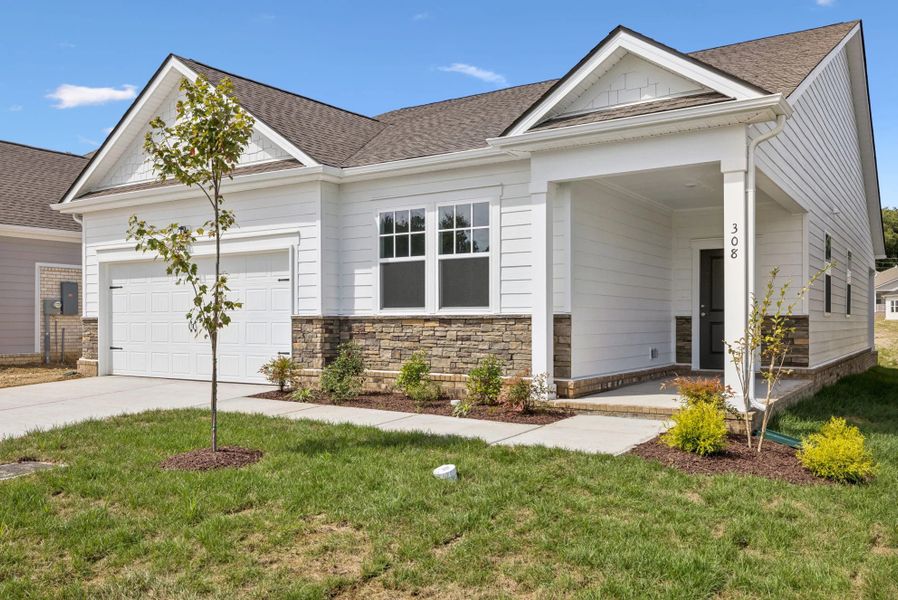 Front exterior of a new home in Cedars of Cane Ridge | 55+ Community, Antioch, TN, highlighting curb appeal (Image 24).