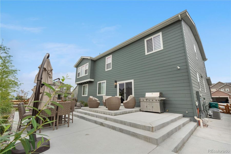 Front exterior of a new home in Morgan Hill, Erie, CO, highlighting curb appeal (Image 23).