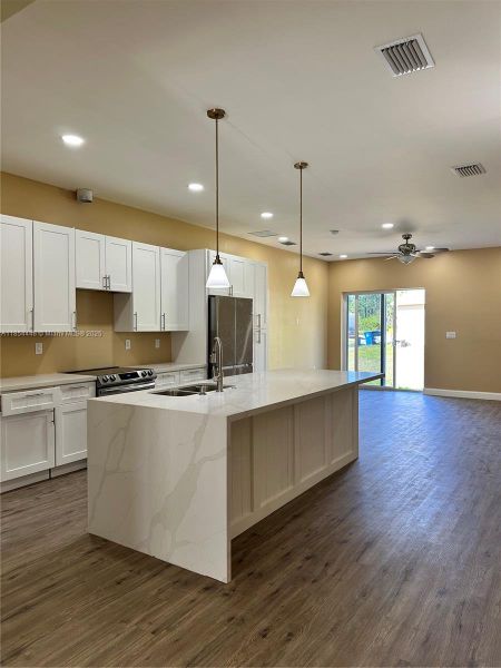 Furnished interior view inside a new home in , Palm Bay (Image 8). Furnished interior view inside a new home in , Palm Bay (Image 8).