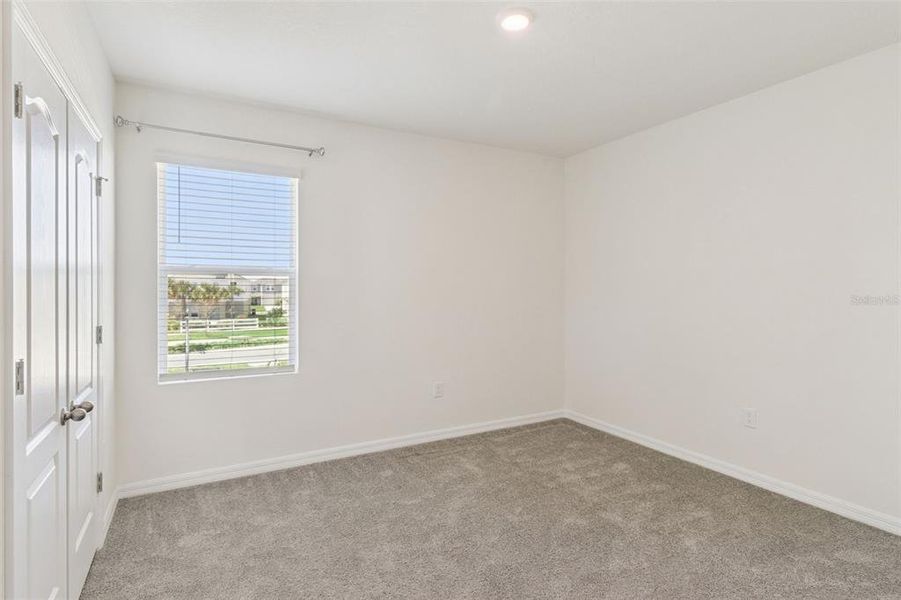 Spacious, unfurnished interior of a new home in Harmony at Lake Eloise, Winter Haven (Image 22).